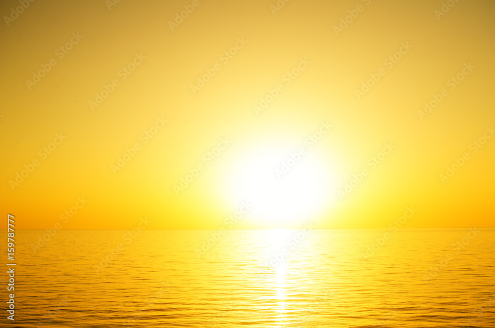 the sun to set over the sea horizon