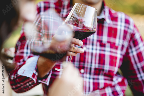 Couple drinking red wine photo