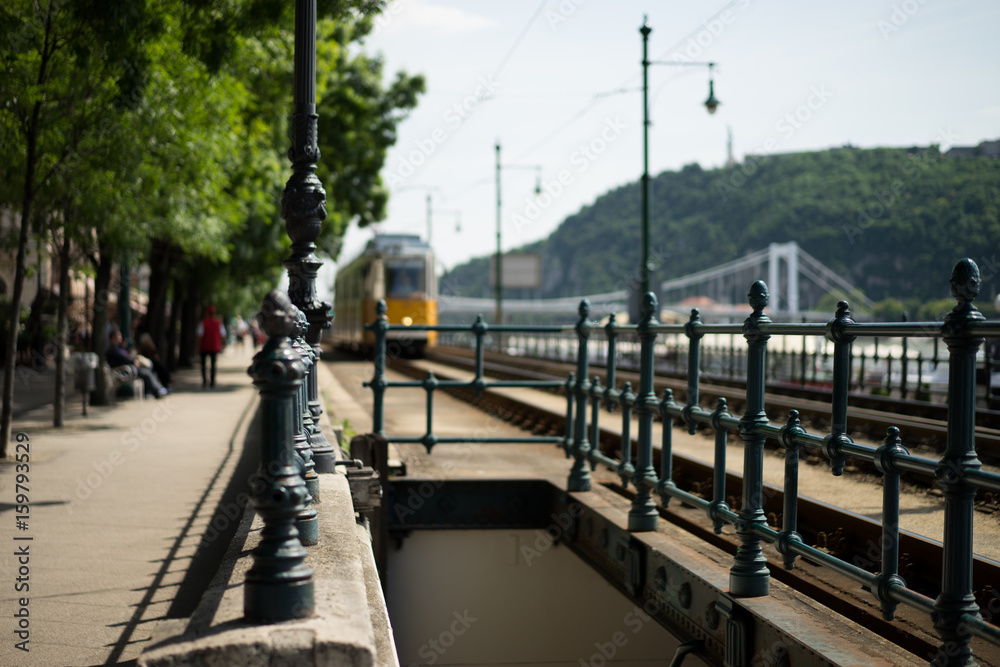 Yellow tram near Chain bridge in Budapest