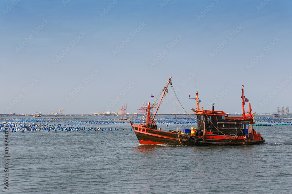 Obraz premium Thai trawler fishing boat in the sea.