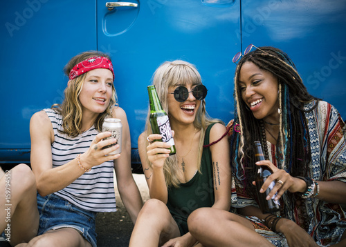 Friends Drinking Alcohol Beers Together on Road Trip Journey