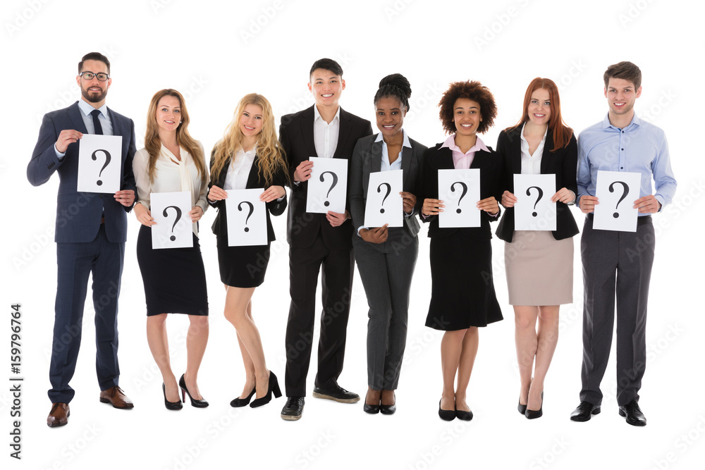 Obraz premium Businesspeople Holding Question Mark Sign