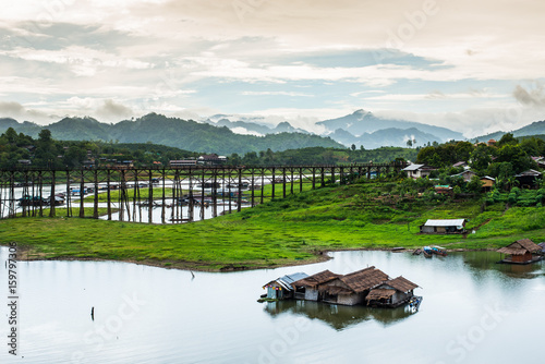 (Mon Bridge) Wooden bridge over the river in Sangkhlaburi District, Kanchanaburi, Thailand.