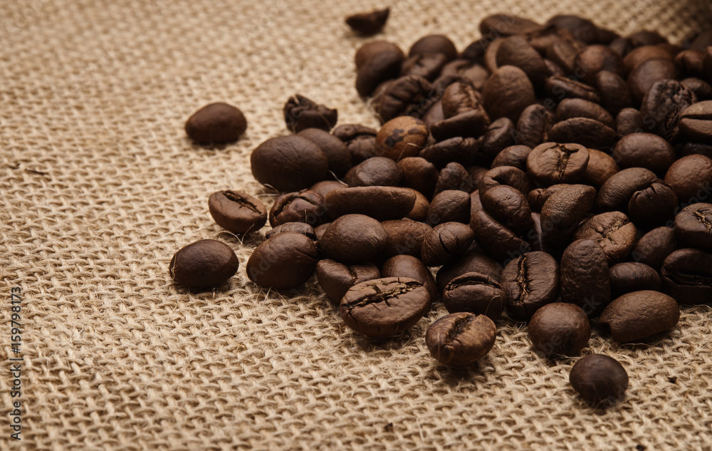 Coffee beans on burlap Coffee beans on burlap