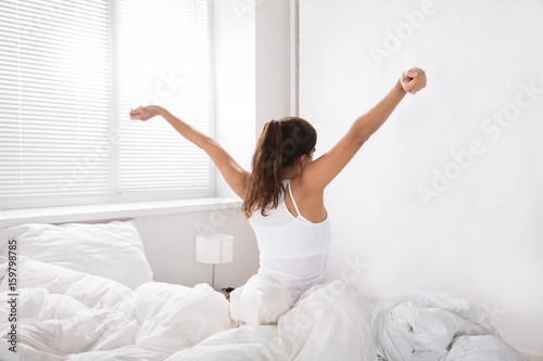 Rear View Of A Woman Wake Up