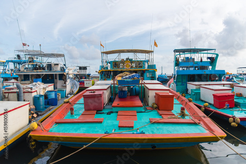 Fishing boats in the harbor in city Male, capital of Maldives