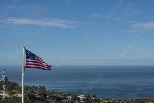 US flag over looking the ocean