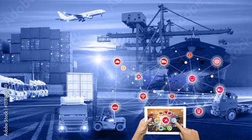 Logistics and transportation of Container Cargo ship anHand holding tablet is pressing button on touch screen interface in front Logistics Industrial Container Cargo freight ship for Concept of fast o