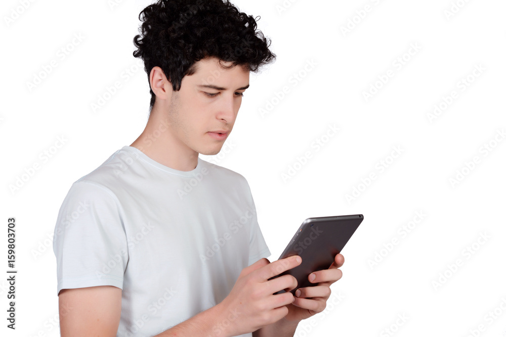 Portrait of young man using tablet. Portrait of young man using tablet.