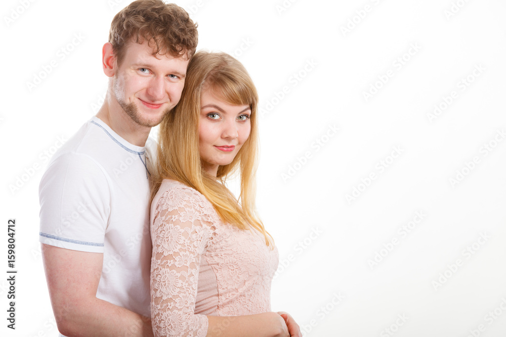 Happy enamoured couple hugging each other. Happy enamoured couple hugging each other.