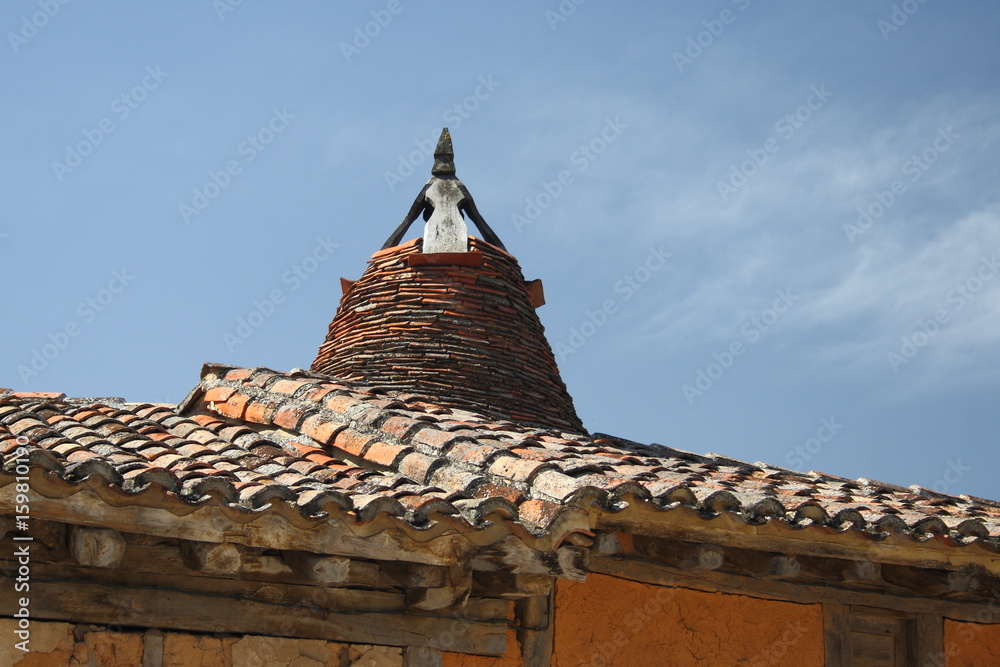 Ταπετσαρία Popular architecture in Soria, Spain, Calatañazor, facades of branches with mud,