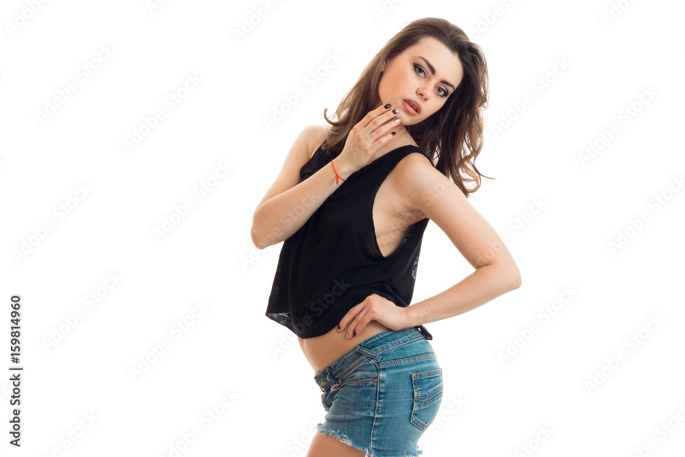 sexy pretty girl poses on cam in black t-shirt and shorts Stock Photo |  Adobe Stock