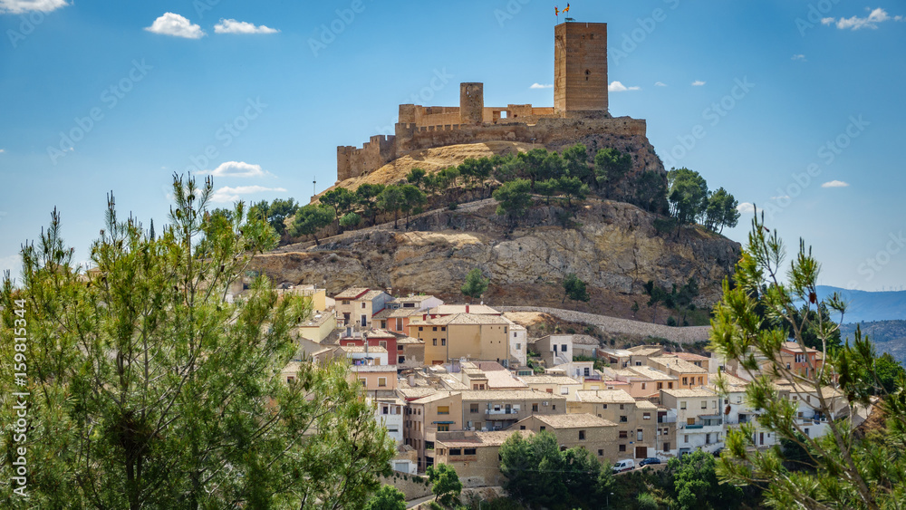 Biar castle at top of hill over town, Alicante, Spain