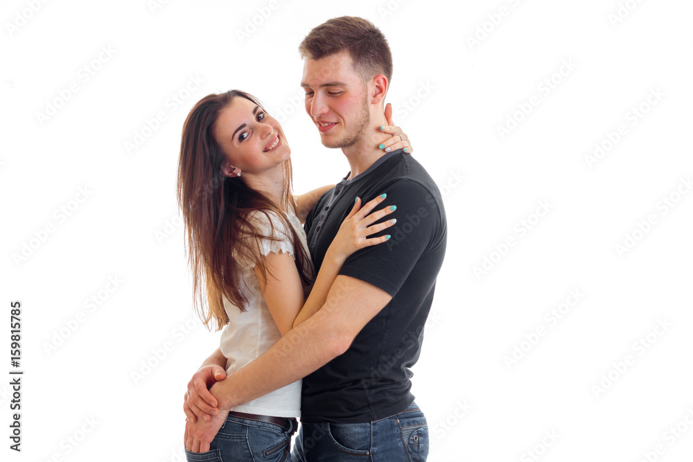 handsome guy embraces his girl's buttocks and waist handsome guy embraces his girl's buttocks and waist