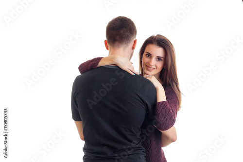 young love romantic couple stand in the Studio and are hugging