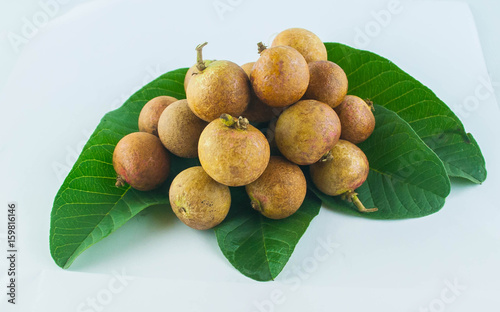 fruit or literally translated as Cat Eye Fruit , a subspecies of the Longan Fruit over white background. photo