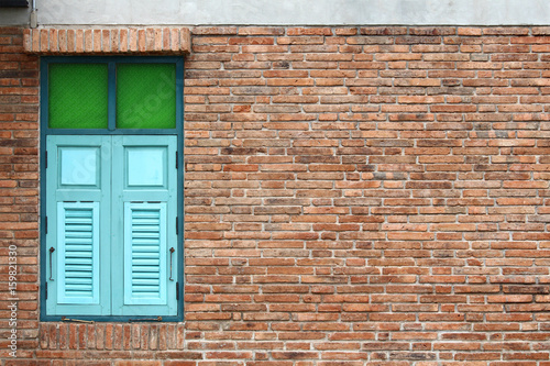 Retro windows in brick wall
