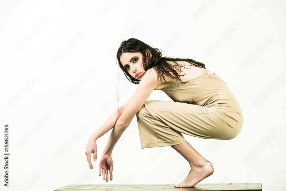 Fototapeta premium girl with fashionable makeup and long hair on white