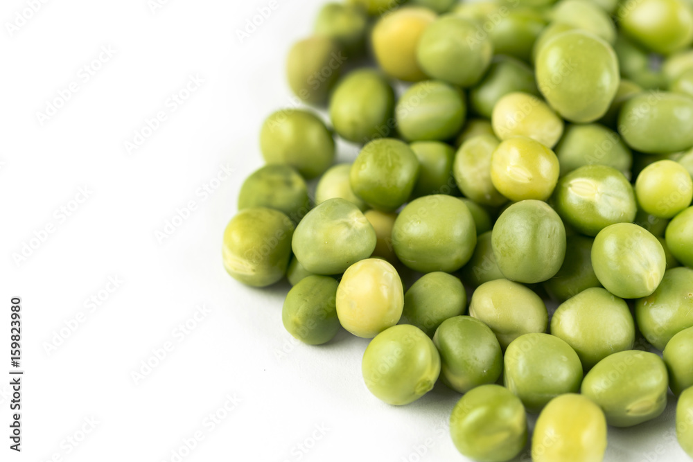 Pile of fresh raw green peas isolated over white background with copy space Pile of fresh raw green peas isolated over white background with copy space