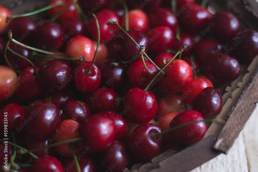 Cherry berries are fresh on a wooden background. Concept of health. Cherry berries are fresh on a wooden background. Concept of health.