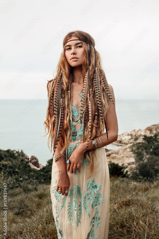 beautiful young boho girl on hill sea background Stock Photo | Adobe Stock