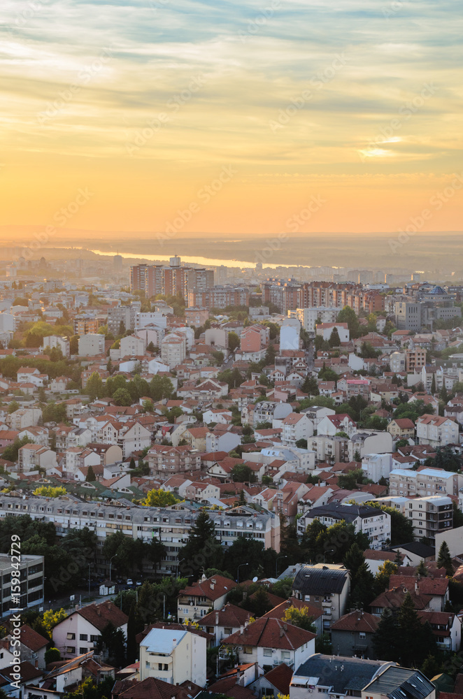 Naklejka premium View on the city at sunset