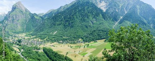 The rural village of Olivone on the Swiss alps photo