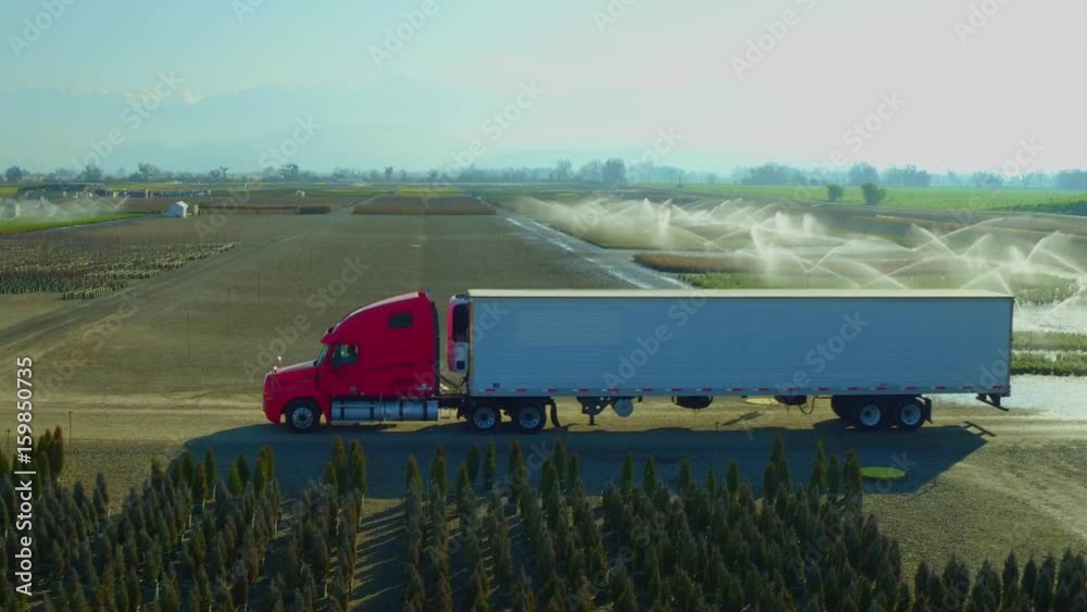 Tractor Truck Farm Lands Giant Long Grass Fields Mountains Bakersfields California Wide Aerial Moving Forward Evening Sunset Tractor Truck Farm Lands Giant Long Grass Fields Mountains Bakersfields California Wide Aerial Moving Forward Evening Sunset