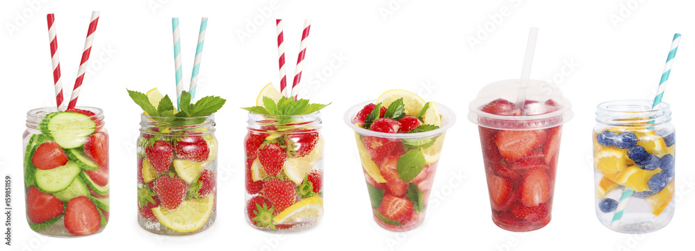 Drinks from strawberries, blueberries, orange, cucumber. Collage of lemonades isolated on white background. Set of different refreshing drink with striped straw. Drinks in a glass jar.