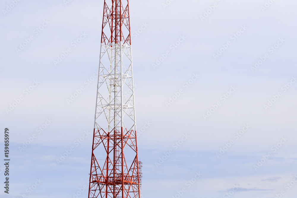 Telecommunication or Antenna tower building with the blue sky.The telecommunication concept.