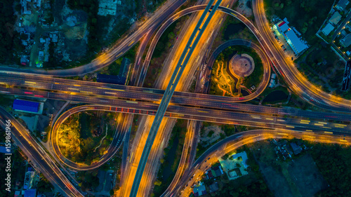 Bangkok Expressway top view, Top view over the highway,expressway and motorway at night, Aerial view interchange of a city, Shot from drone, Expressway is an important infrastructure in Thailand photo