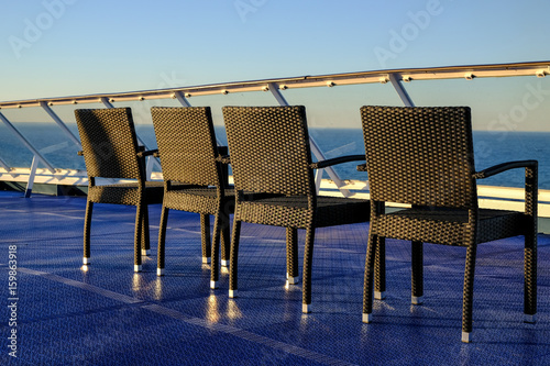 Helsinki, Finland - 29 May 2017: Chairs on the deck Silja Line Symphony photo