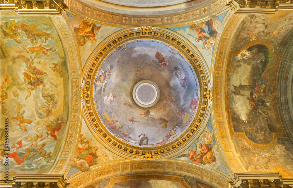 TURIN, ITALY - MARCH 13, 2017: The neo - baroque cupola with motive Glory of St. Theresia and the Four Evangelists in church Chiesa di Santa Teresa by Luigi Vacca (1820).