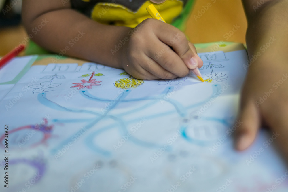 closeup hand child drawing picture closeup hand child drawing picture