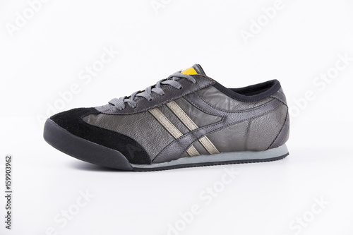 Female Black Sneaker on White Background, Isolated Product, Top View, Studio.