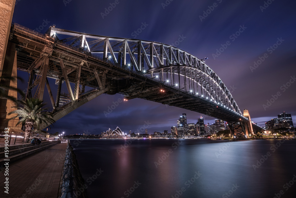 Obraz premium Night skyline of Sydney downtown with Harbour Bridge, NSW, Australia
