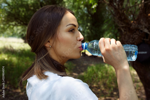 woman drinking fresh water.
