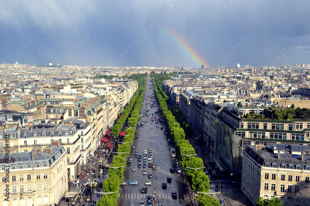 Obraz premium Incredible view from the top of The Arc de Triomphe in Paris. Rainbow upon The Avenue des Champs-Élysées.
