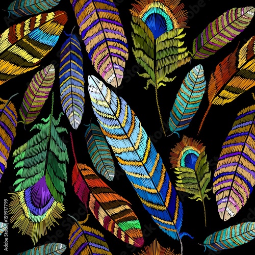 Color feathers embroidery seamless pattern. Beautiful bright tropical peacock feathers embroidery, hand drawn fashion template for clothes, textiles, t-shirt design