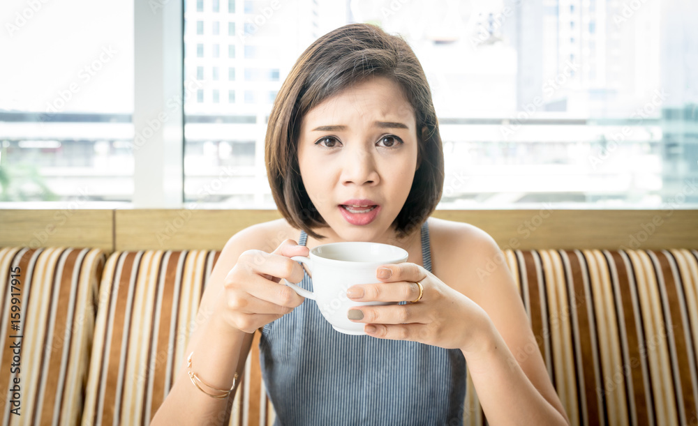 Asian woman enjoy drinking a coffee in the morning Asian woman enjoy drinking a coffee in the morning