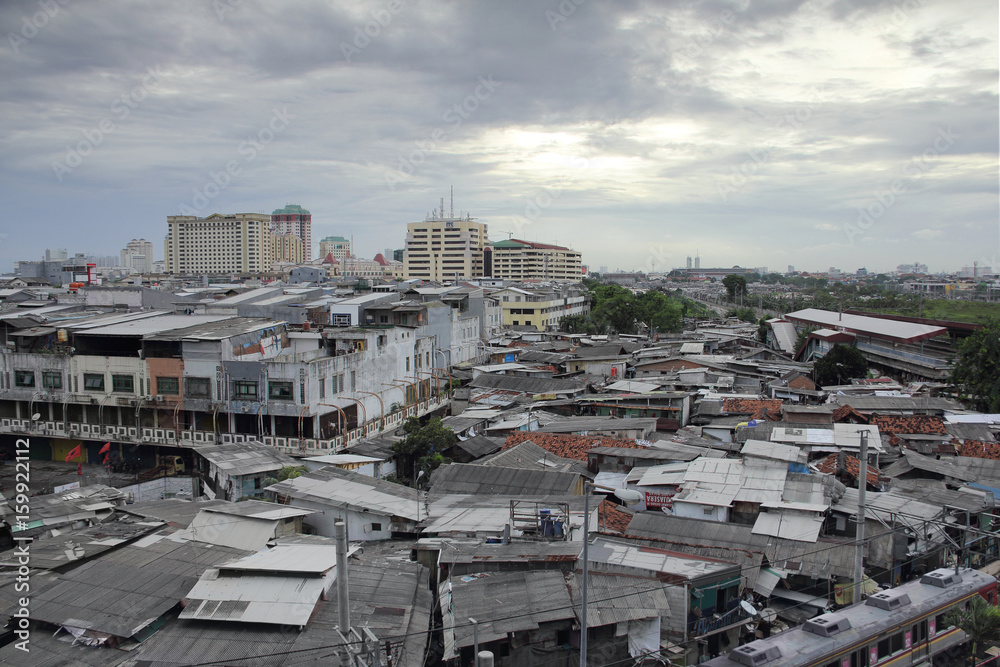 Fototapeta premium JAKARTA, December 5th, 2016. Densely populated area. Urban cityscape