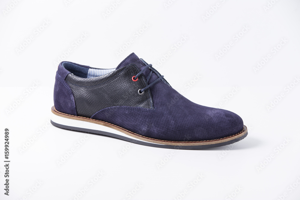 Male Blue Shoe on White Background, Isolated Product, Top View, Studio. Male Blue Shoe on White Background, Isolated Product, Top View, Studio.