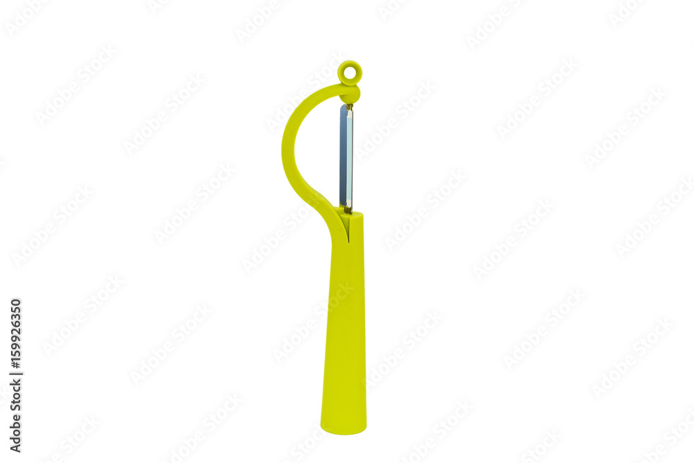 Modern green vegetable peeler isolated on white Modern green vegetable peeler isolated on white