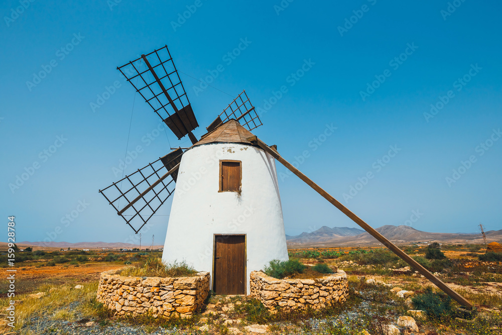 Traditional white stony windmill at Fuertaventura, Canary Islands, Spain