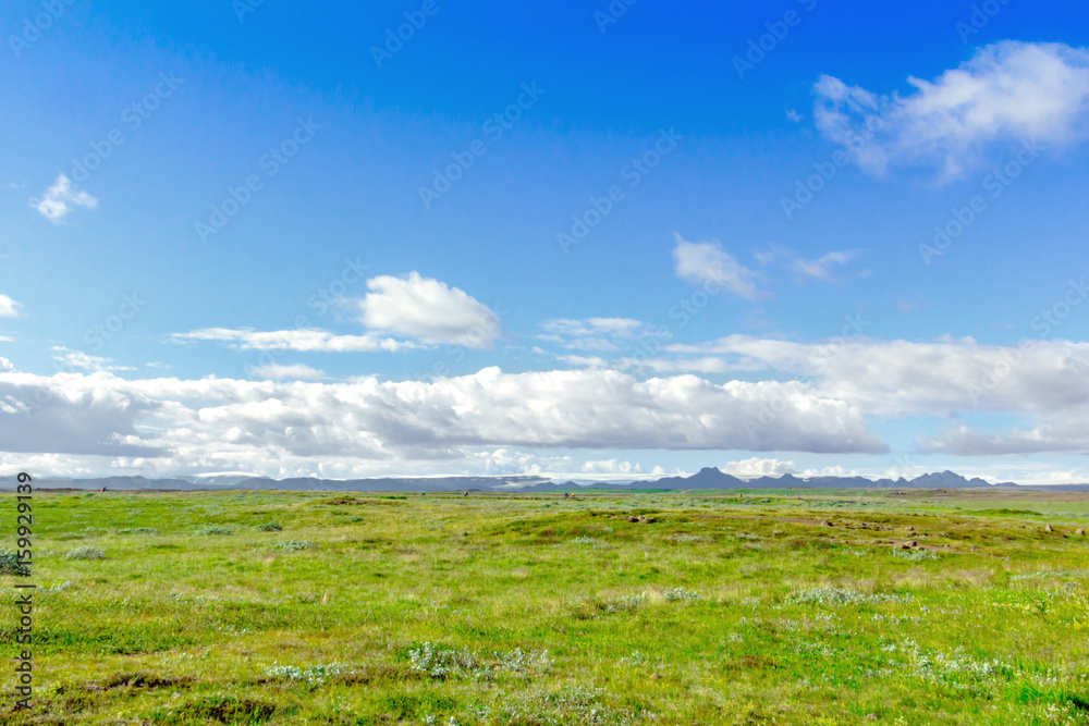 Beautiful Icelandic landscape with mountains, sky and clouds Beautiful Icelandic landscape with mountains, sky and clouds