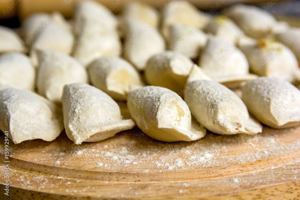 Cooking traditional Russian dumplings vareniki Cooking traditional Russian dumplings vareniki