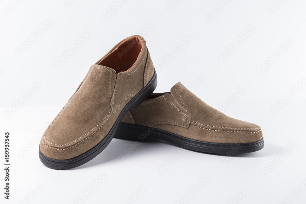 Male Brown Shoe on White Background, Isolated Product, Top View, Studio. Male Brown Shoe on White Background, Isolated Product, Top View, Studio.