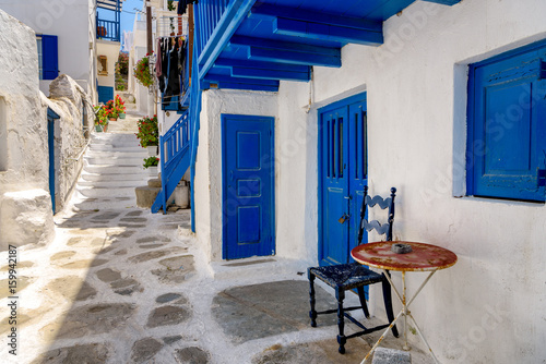 Fototapeta Naklejka Na Ścianę i Meble -  Blue and white alley in Mykonos island, Greece