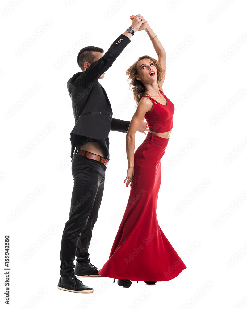 Young elegant couple dancing, isolated on white Young elegant couple dancing, isolated on white