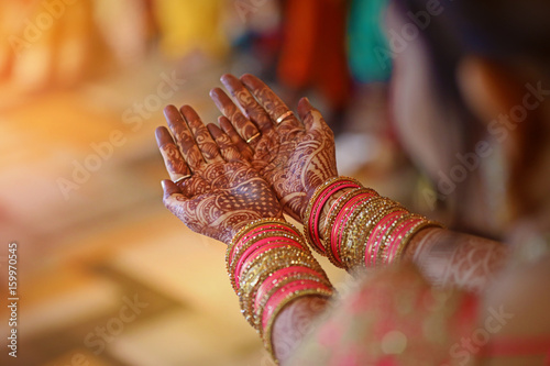 bangles set in bridal hand photo